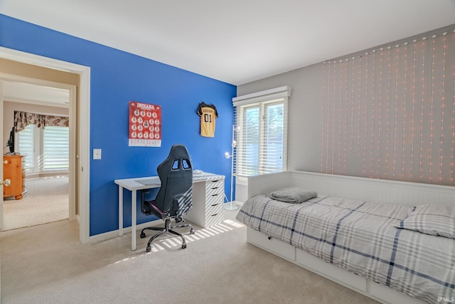 119 Highland Dr, Wabash, IN 46992 - carpeted bedroom with baseboards and a desk