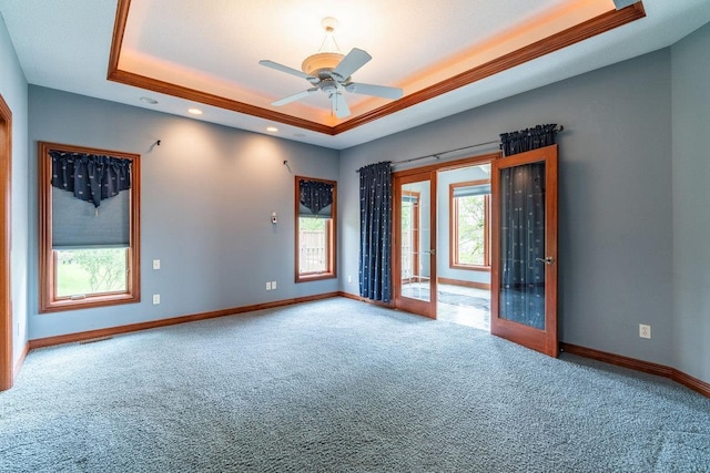 20 Lane 650c Snow Lk, Fremont, IN 46737 - unfurnished room with a raised ceiling, carpet flooring, healthy amount of natural light, and recessed lighting