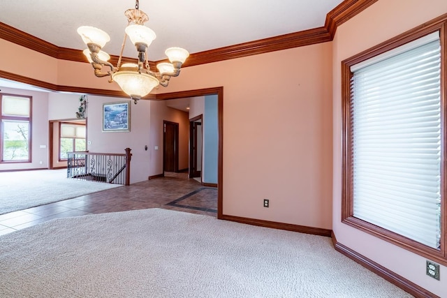 20 Lane 650c Snow Lk, Fremont, IN 46737 - carpeted empty room featuring a chandelier, crown molding, baseboards, and tile patterned flooring