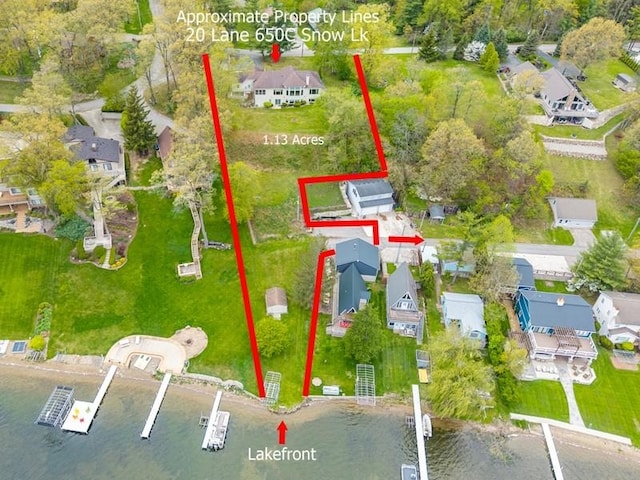 20 Lane 650c Snow Lk, Fremont, IN 46737 - aerial view of residential area with a nearby body of water and property boundaries highlighted