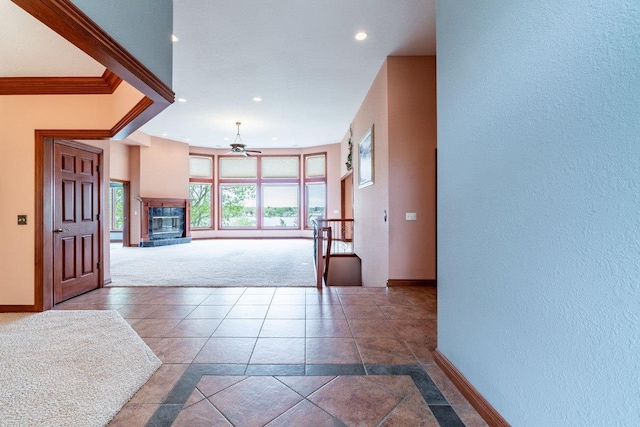 20 Lane 650c Snow Lk, Fremont, IN 46737 - carpeted foyer with baseboards, a ceiling fan, recessed lighting, a textured wall, and a tile fireplace