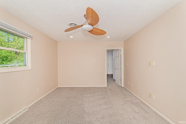 5002 Buffalo Ct, Fort Wayne, IN 46804 - empty room with carpet, recessed lighting, ceiling fan, a textured ceiling, and baseboards