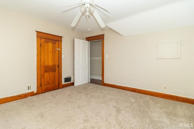 unfurnished bedroom with carpet, baseboards, and ceiling fan