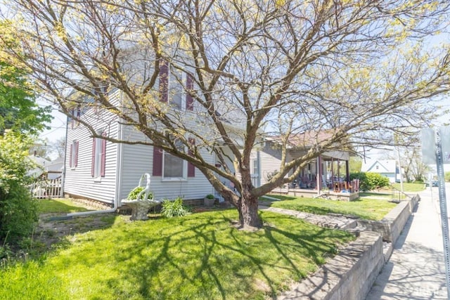 view of home's exterior featuring a lawn