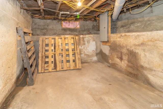 unfinished below grade area featuring electric panel