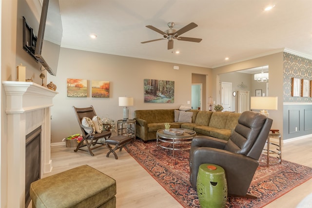 5512 Abbe Wood Dr, Newburgh, IN 47630 - living room with light wood-style floors, recessed lighting, a ceiling fan, baseboards, and crown molding