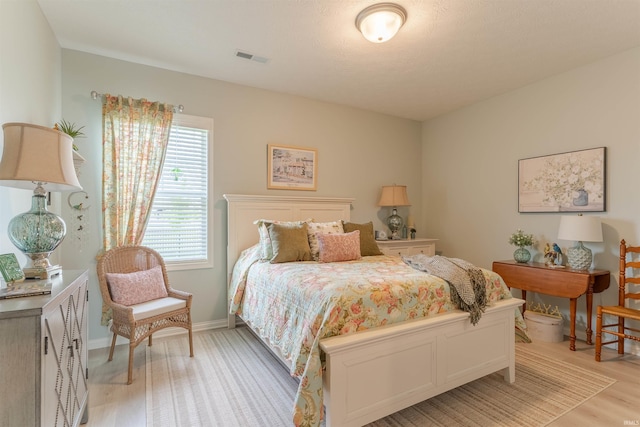 5512 Abbe Wood Dr, Newburgh, IN 47630 - bedroom with light wood-type flooring and baseboards