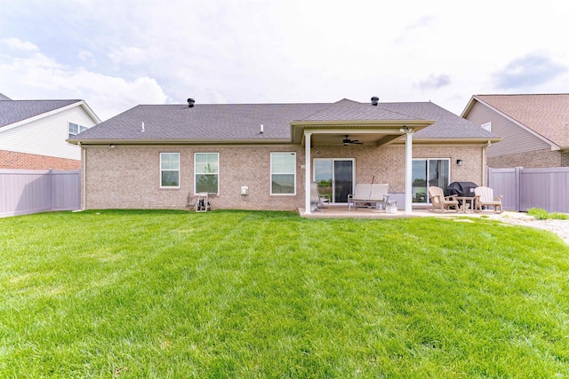 5512 Abbe Wood Dr, Newburgh, IN 47630 - rear view of house featuring a ceiling fan, a patio, brick siding, and roof with shingles