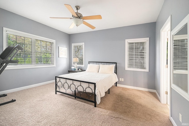 19781 Hidden Meadow Trl, Goshen, IN 46528 - carpeted bedroom featuring baseboards and ceiling fan