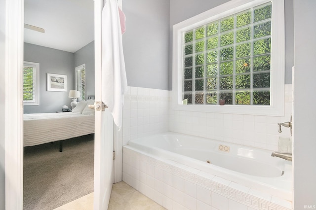 19781 Hidden Meadow Trl, Goshen, IN 46528 - full bath with plenty of natural light, ensuite bathroom, a garden tub, and tile patterned floors
