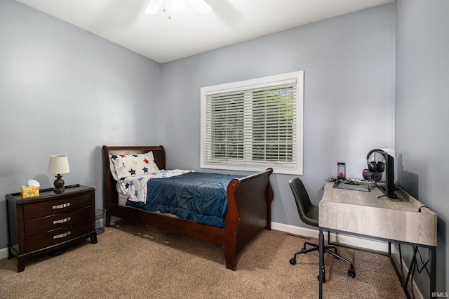 19781 Hidden Meadow Trl, Goshen, IN 46528 - carpeted bedroom featuring baseboards, an office area, and ceiling fan