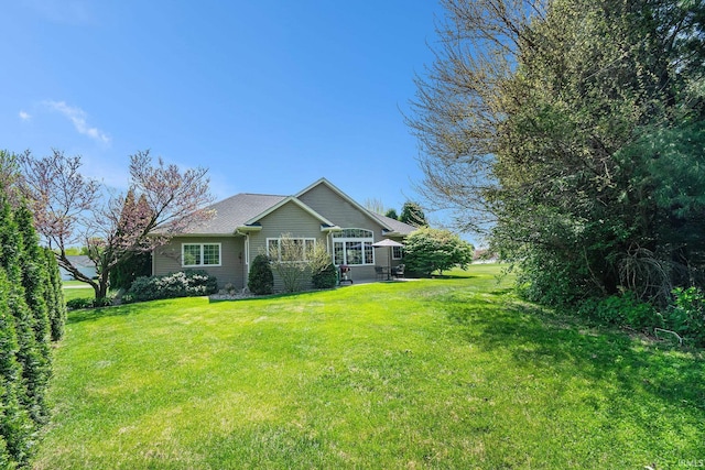 19781 Hidden Meadow Trl, Goshen, IN 46528 - rear view of property with a lawn