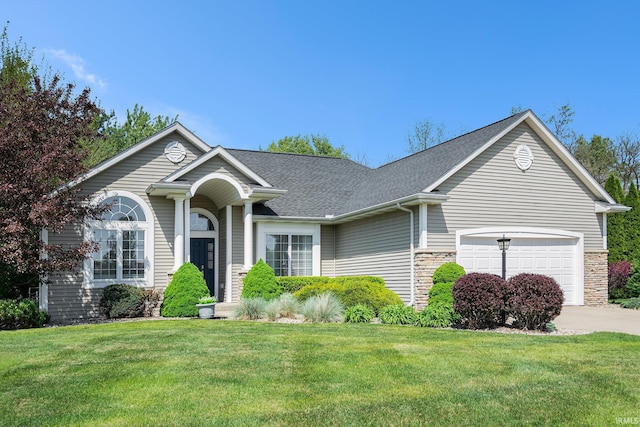 19781 Hidden Meadow Trl, Goshen, IN 46528 - ranch-style house featuring a front lawn, a garage, concrete driveway, roof with shingles, and stone siding