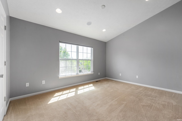 2378 The Springs Dr, Indianapolis, IN 46260 - empty room featuring light carpet, baseboards, recessed lighting, and lofted ceiling