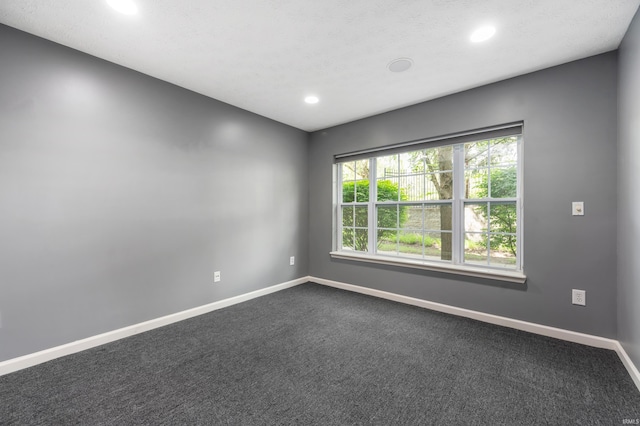 2378 The Springs Dr, Indianapolis, IN 46260 - spare room featuring baseboards, dark carpet, and recessed lighting
