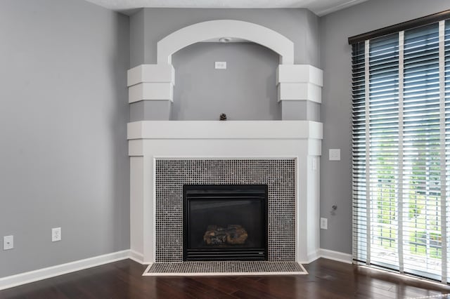 2378 The Springs Dr, Indianapolis, IN 46260 - detailed view of wood finished floors, a fireplace, and baseboards