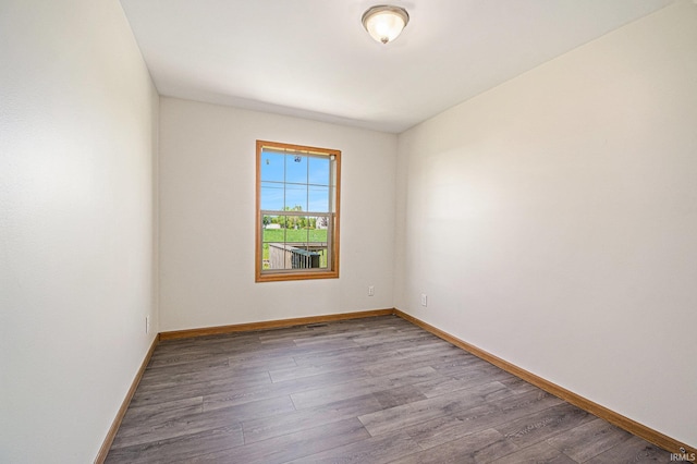 26183 Northland Crossing Dr, Elkhart, IN 46514 - spare room featuring wood finished floors and baseboards