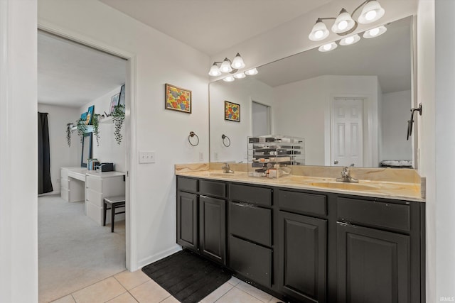 25860 Running Creek Dr, South Bend, IN 46628 - bathroom featuring double vanity, tile patterned flooring, and baseboards