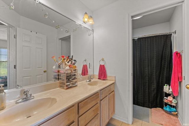 25860 Running Creek Dr, South Bend, IN 46628 - bathroom featuring tile patterned flooring, double vanity, and a shower with curtain