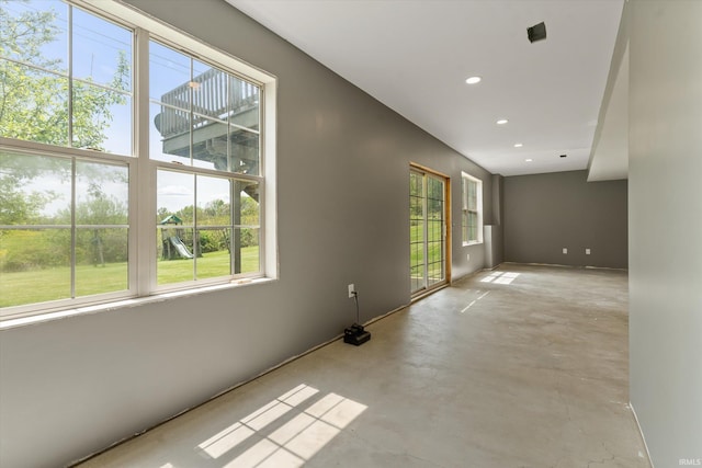 25860 Running Creek Dr, South Bend, IN 46628 - spare room with plenty of natural light, concrete flooring, and recessed lighting