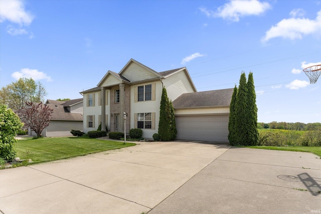 25860 Running Creek Dr, South Bend, IN 46628 - view of front of house featuring driveway, an attached garage, and a front yard