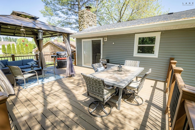 wooden deck featuring an outdoor hangout area, outdoor dining space, and a gazebo