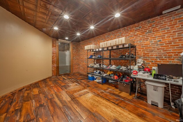 28 N Washington St, Knightstown, IN 47362 - office featuring brick wall, hardwood / wood-style flooring, baseboards, and recessed lighting