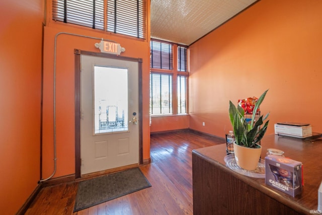 28 N Washington St, Knightstown, IN 47362 - foyer entrance featuring wood finished floors and baseboards