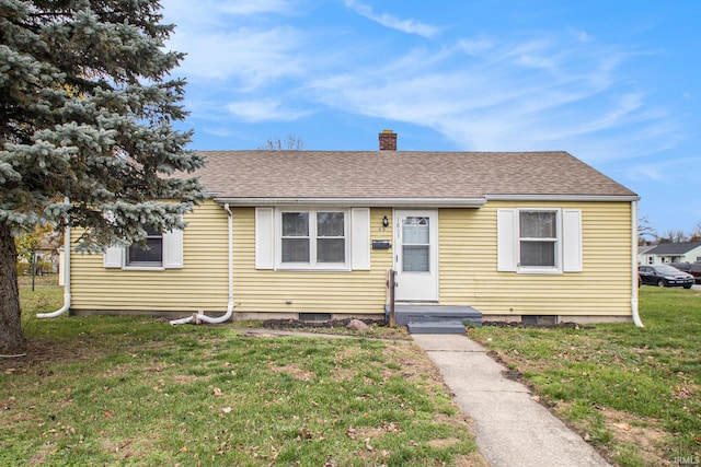 1803 W Dubail St, South Bend, IN 46613 - bungalow-style house with a chimney, a front yard, and roof with shingles