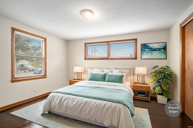 1803 W Dubail St, South Bend, IN 46613 - bedroom with multiple windows, wood finished floors, and baseboards