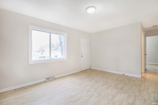 517 S Chicago St, South Bend, IN 46619 - empty room featuring light wood-style floors and baseboards