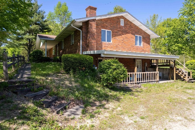 2105 N 100 W, Winchester, IN 47394 - view of side of property with brick siding and a chimney