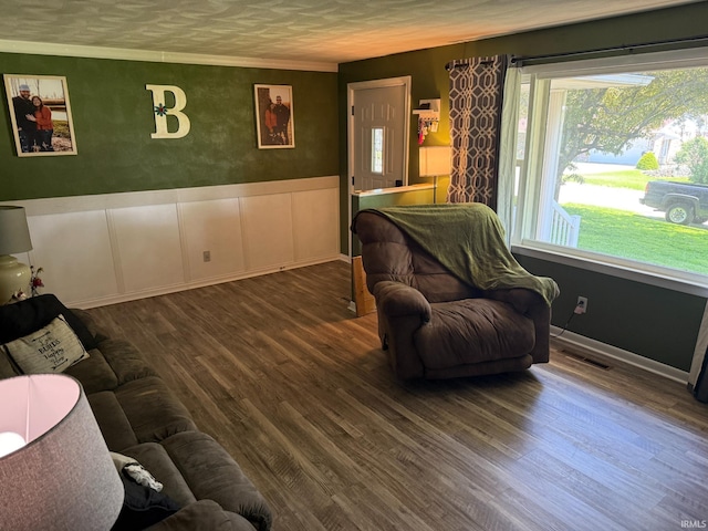 310 Edgeway Dr, Alexandria, IN 46001 - living room with wainscoting, wood finished floors, and crown molding