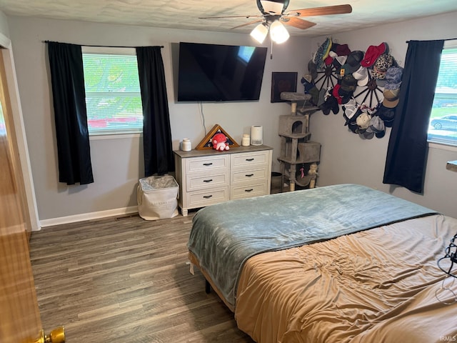 310 Edgeway Dr, Alexandria, IN 46001 - bedroom with wood finished floors, a ceiling fan, and baseboards