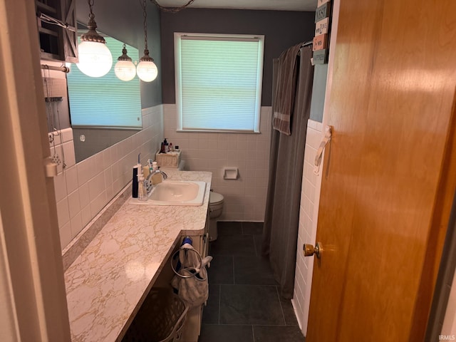 310 Edgeway Dr, Alexandria, IN 46001 - full bath featuring toilet, tile patterned flooring, a wainscoted wall, vanity, and a shower with curtain