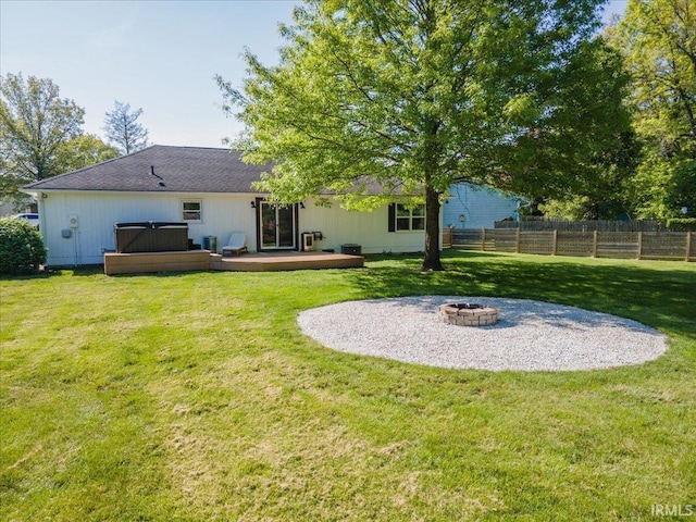 736 Paradise Ave, Lafayette, IN 47905 - back of house with a wooden deck, an outdoor fire pit, and a jacuzzi
