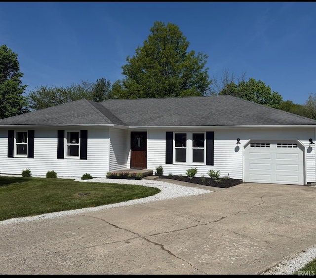 736 Paradise Ave, Lafayette, IN 47905 - single story home with a garage, driveway, a front yard, and a shingled roof