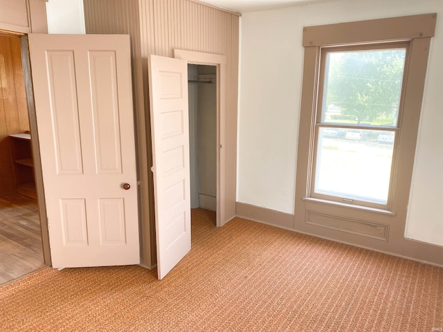 710 N Union St, Union City, IN 47390 - unfurnished bedroom with light colored carpet and a closet