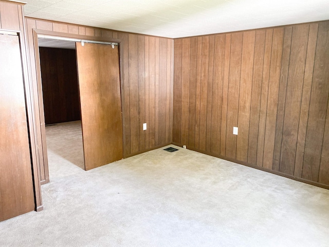 710 N Union St, Union City, IN 47390 - empty room featuring wooden walls and carpet