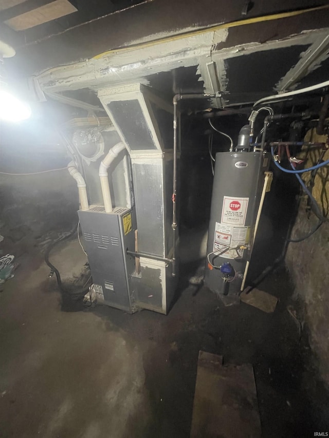 215 Wheatland Avenue St, Logansport, IN 46947 - utility room with gas water heater