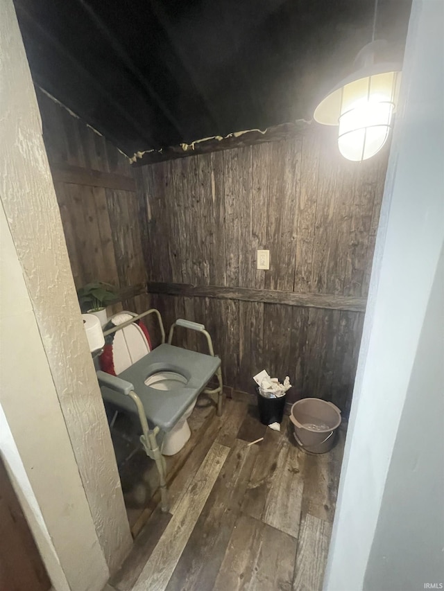 215 Wheatland Avenue St, Logansport, IN 46947 - bathroom with wooden walls and wood finished floors
