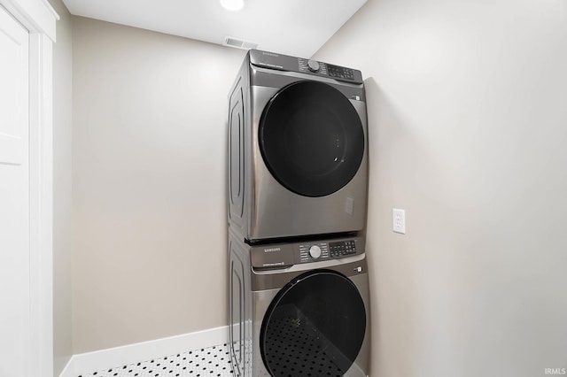 6540 S 070 E, Wolcottville, IN 46795 - washroom with stacked washer / drying machine and baseboards