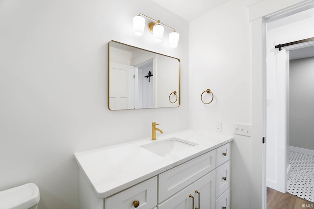 6540 S 070 E, Wolcottville, IN 46795 - bathroom with vanity, toilet, and baseboards
