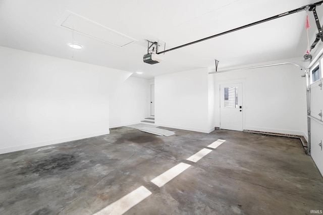 6540 S 070 E, Wolcottville, IN 46795 - garage featuring a garage door opener and baseboards