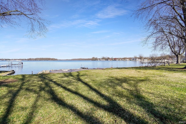 6540 S 070 E, Wolcottville, IN 46795 - view of green lawn featuring a water view and a boat dock