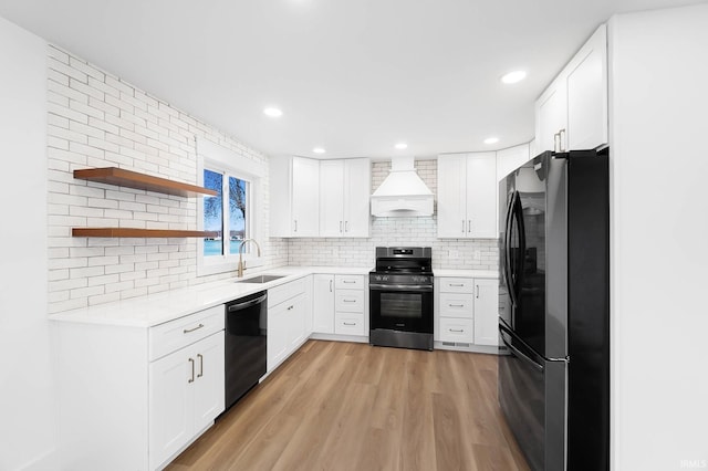 6540 S 070 E, Wolcottville, IN 46795 - kitchen with freestanding refrigerator, premium range hood, stainless steel range with electric stovetop, dishwasher, and a sink