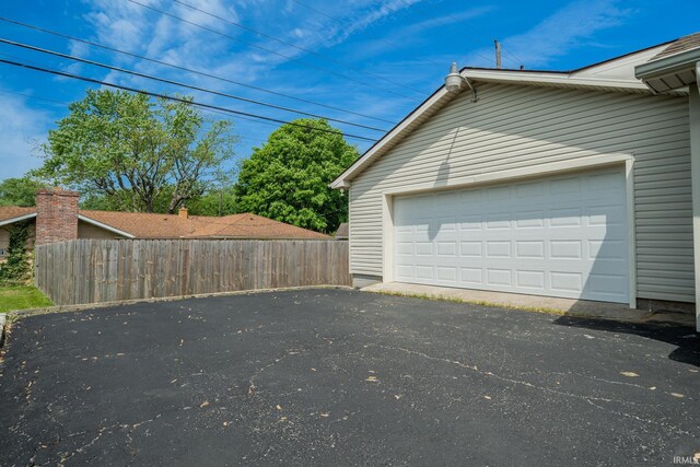 323 N Berkley Rd, Kokomo, IN 46901 - garage featuring fence
