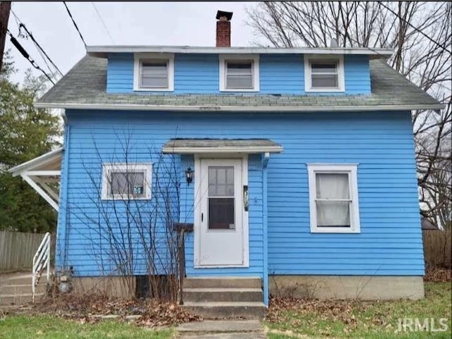 312 Horace Mann Ct, Marion, IN 46952 - bungalow with entry steps and a chimney