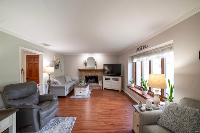 living room with dark wood finished floors, a fireplace, and crown molding