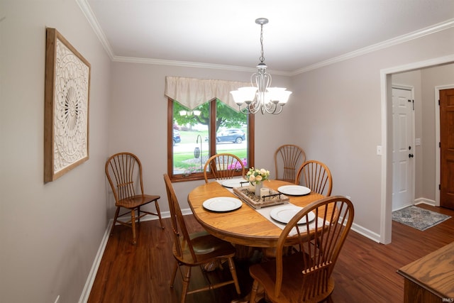 dining room with a chandelier, dark wood-style flooring, baseboards, and crown molding